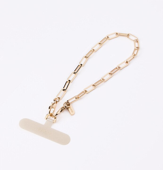 UNIQ COEHL GOLDILOCKS UNIVERSAL PHONE CHARM HANDSTRAP - CHAMPAGNE GOLD